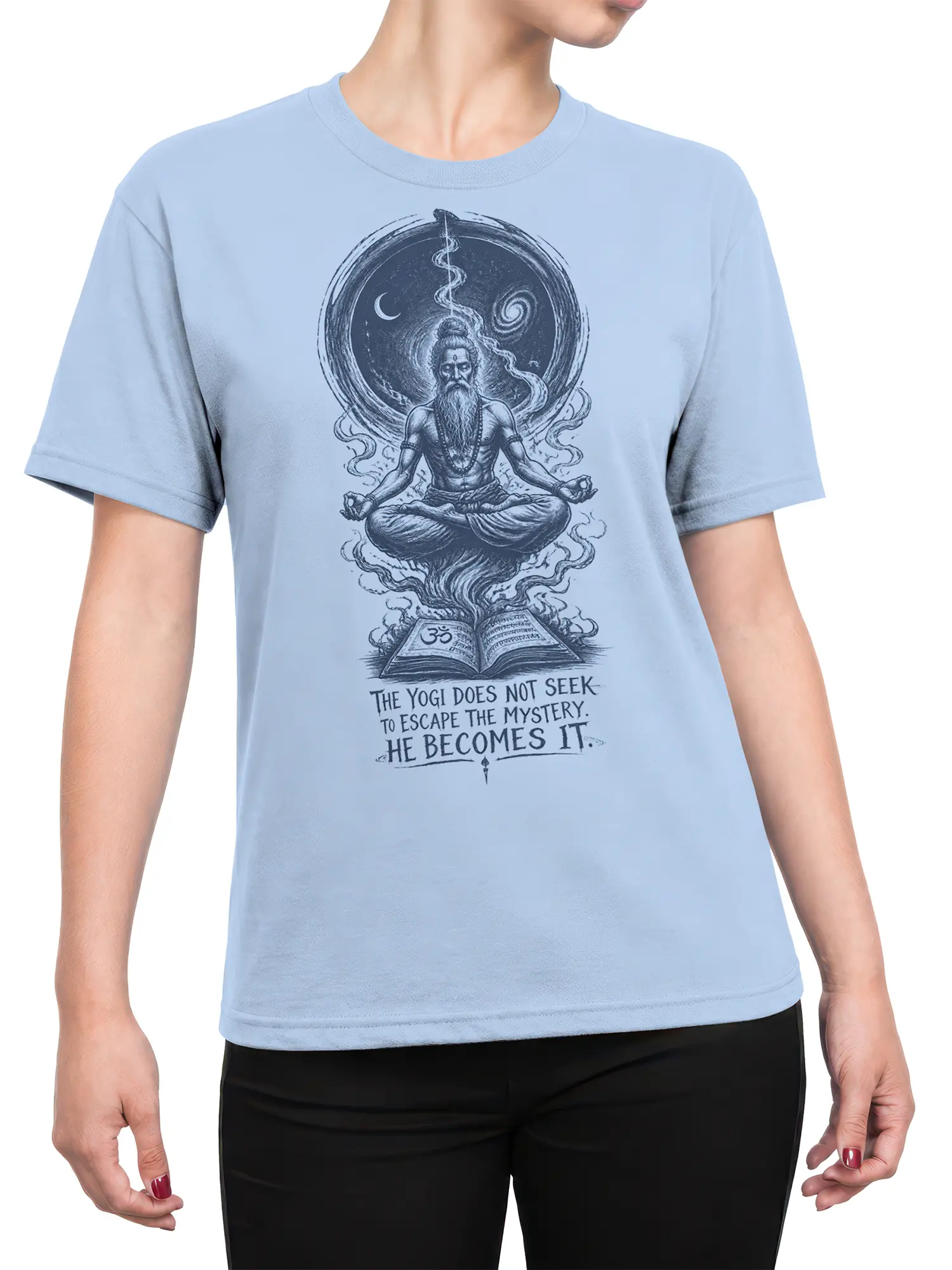 Female torso wearing a light blue yoga shirt with mystical yogi meditation artwork and a spiritual quote