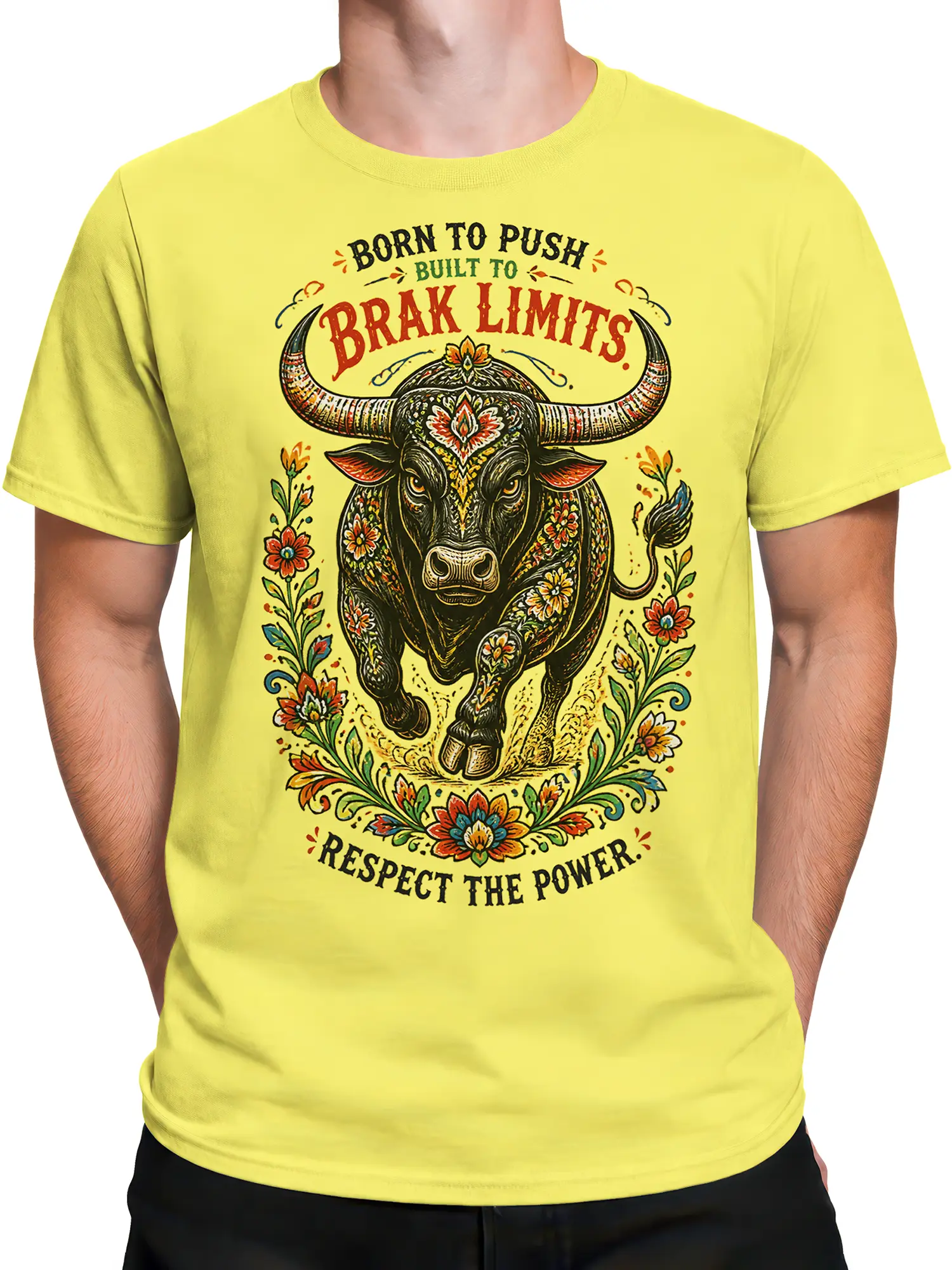 Male torso wearing a yellow bull T-shirt with vintage floral artwork and bold motivational text