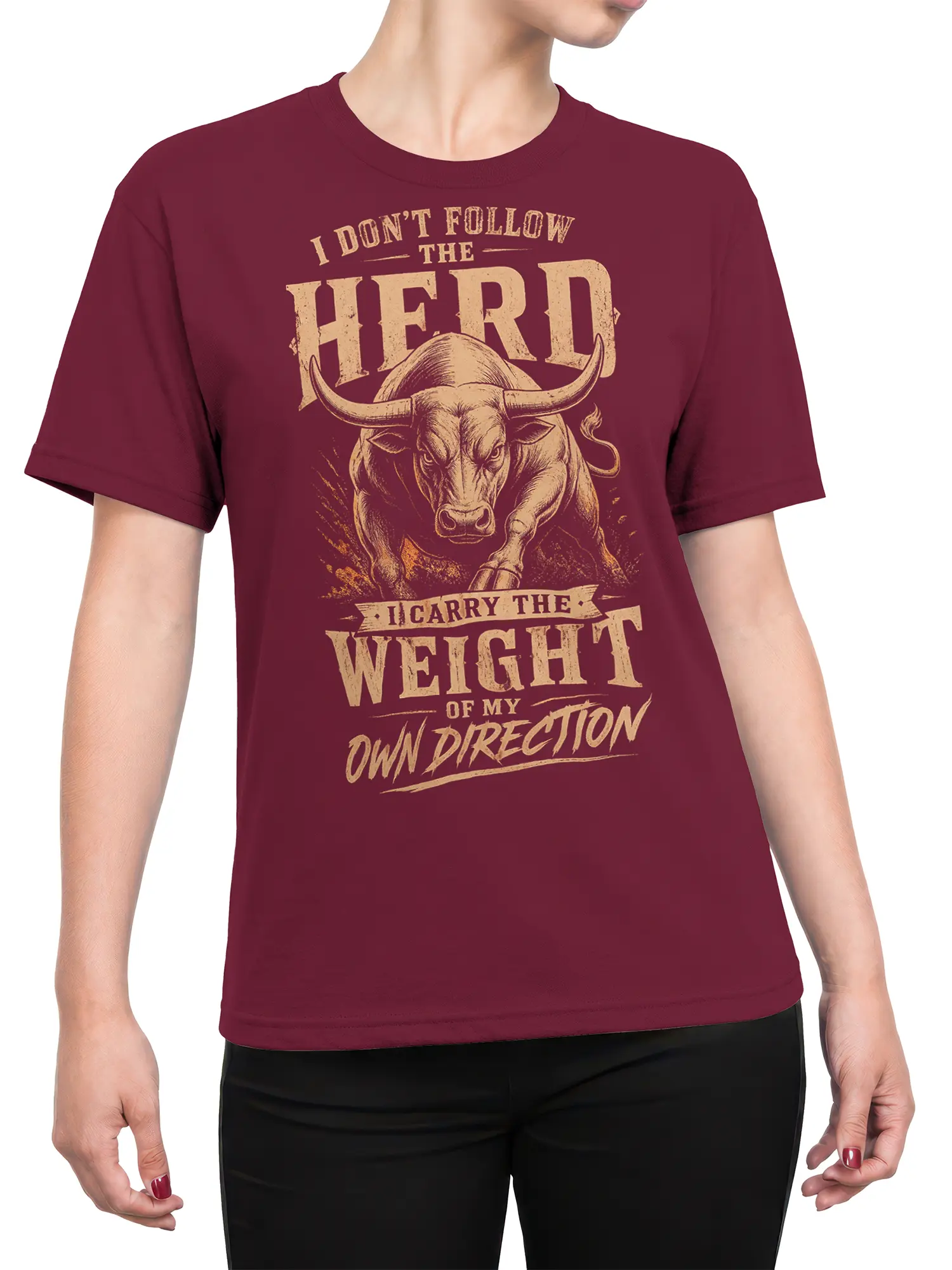 Female torso wearing a burgundy bull T-shirt with vintage cream lettering and an independent spirit message