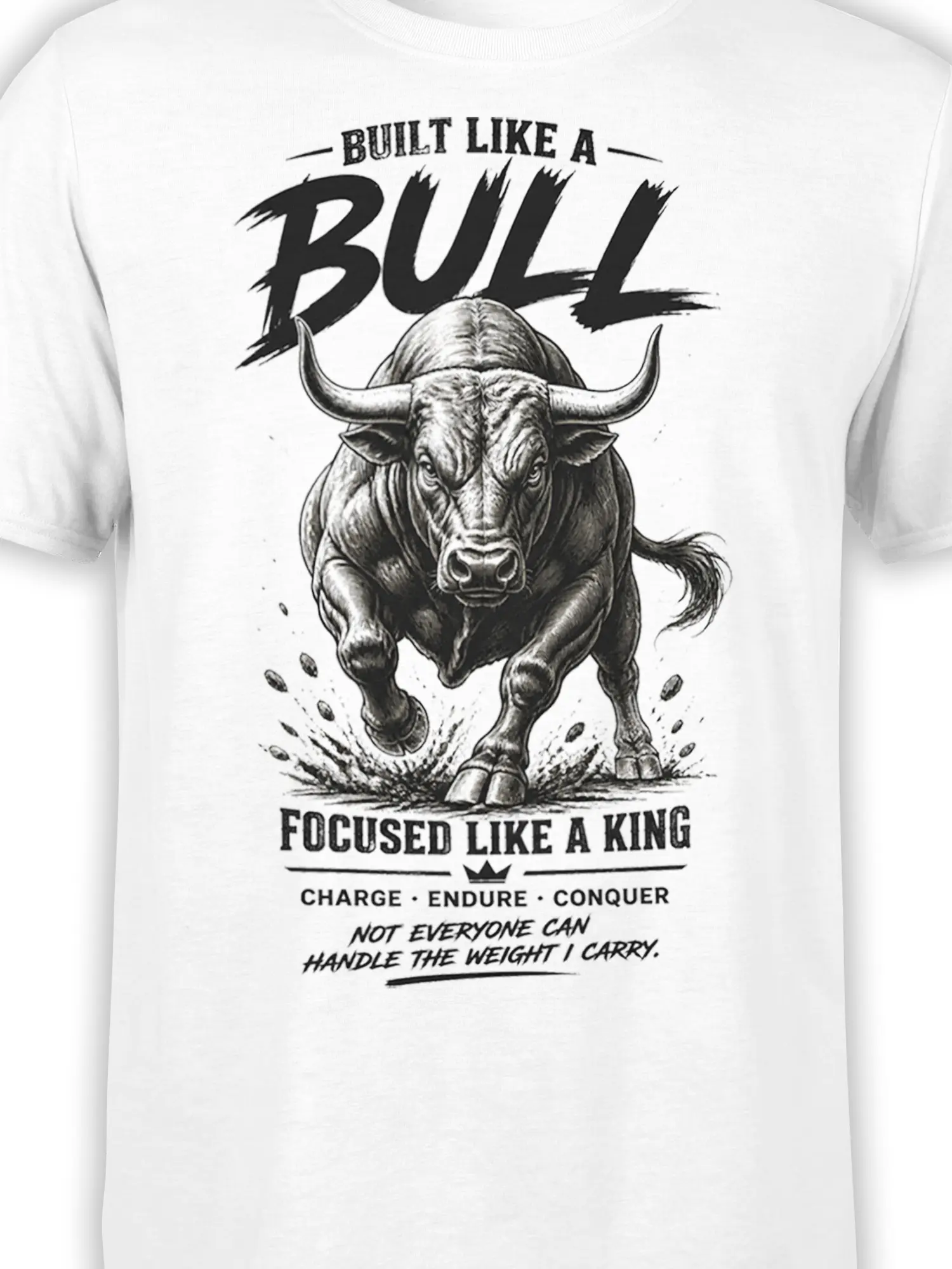 Close-up of charging bull artwork and focused king message on white T-shirt