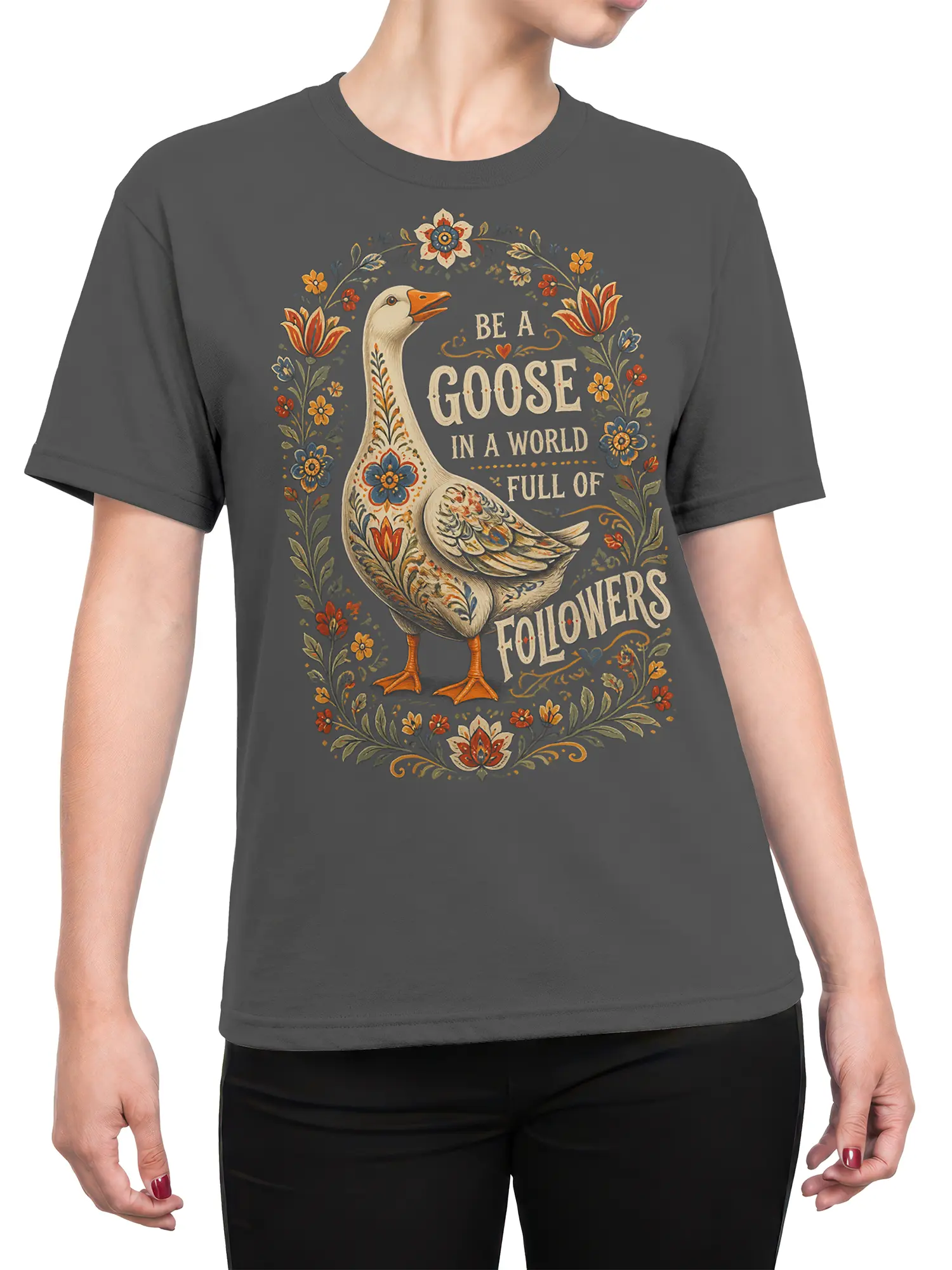 Female torso wearing a gray T-shirt with a colorful floral goose and independent thinker message