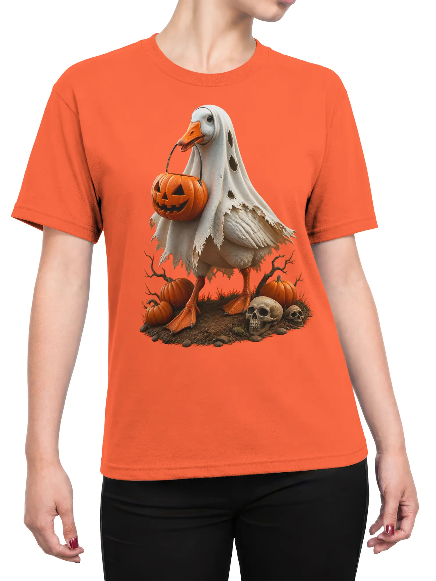 Female torso wearing an orange T-shirt with a ghost goose, pumpkins, jack-o'-lantern, and skulls