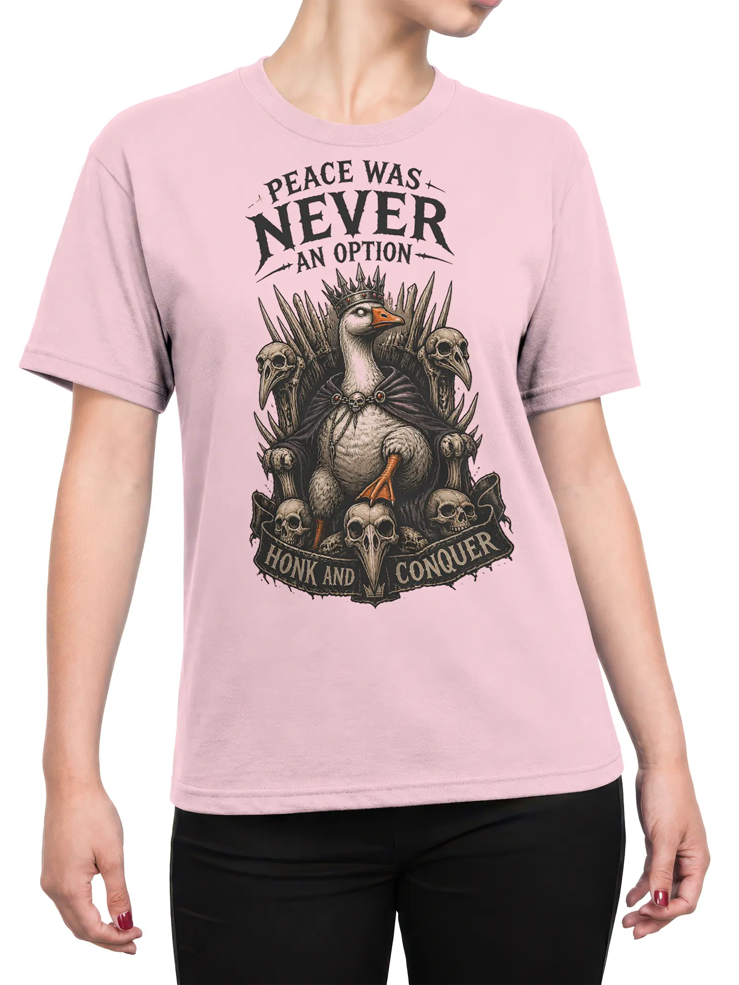 Female torso wearing a pink T-shirt with crowned bird, skull throne, and sarcastic Honk and Conquer design