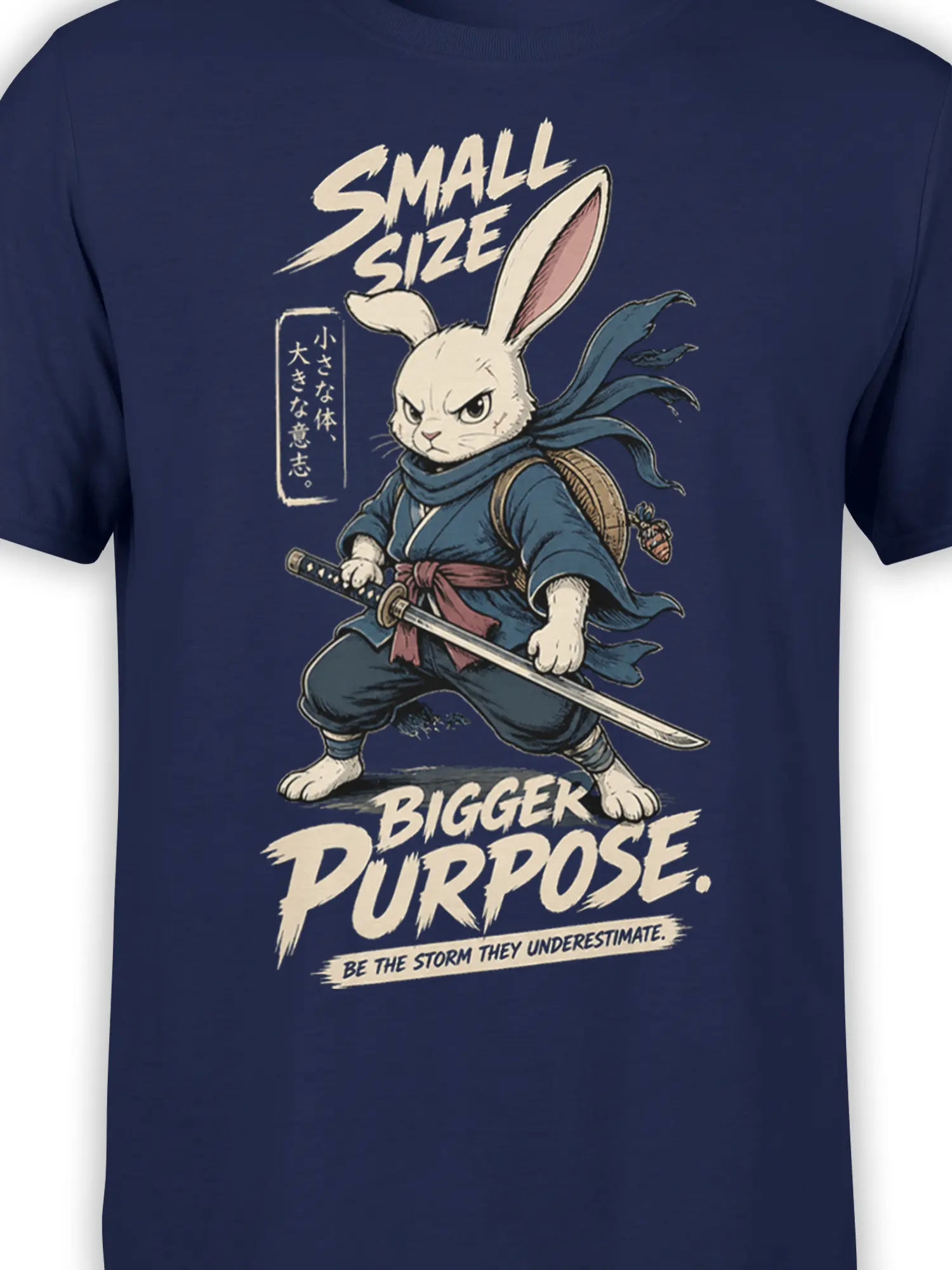 Close-up of rabbit warrior artwork, sword, scarf, and “Small Size Bigger Purpose” text on navy fabric