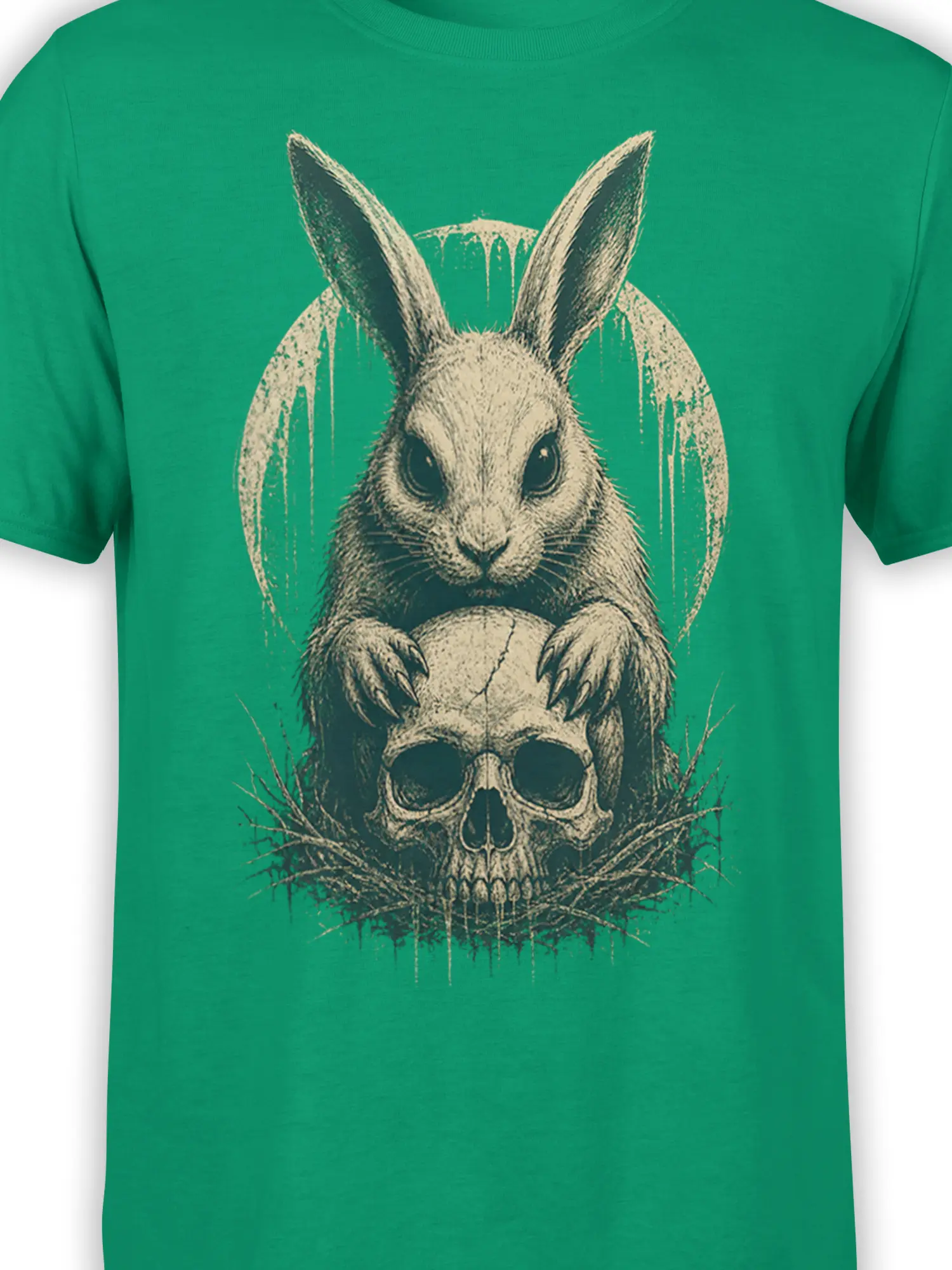 Close-up of a watchful rabbit and weathered skull on a green gothic graphic T-shirt