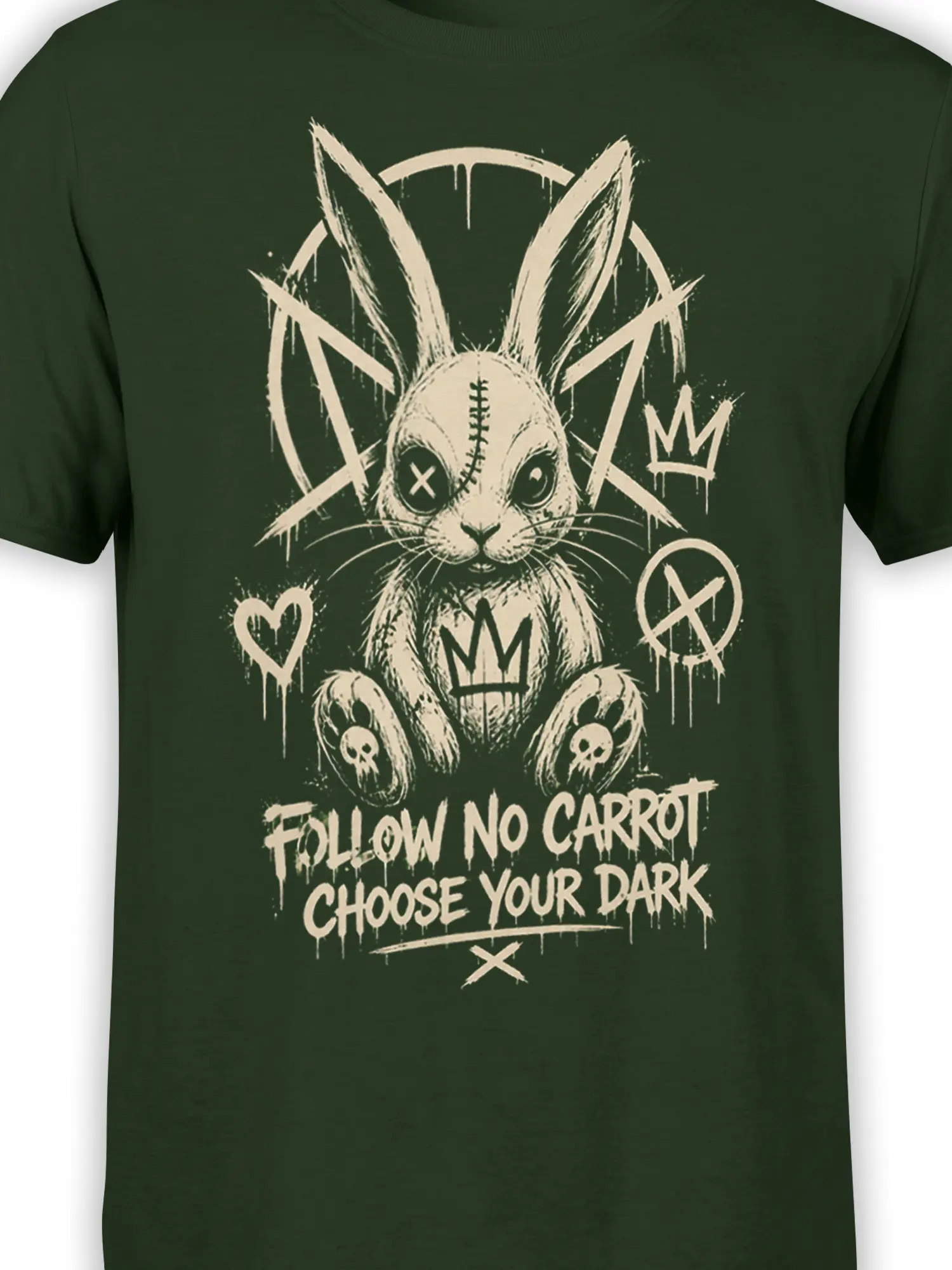 Close-up of crowned gothic rabbit artwork with stitched eye, skull paws, and distressed cream print on green fabric
