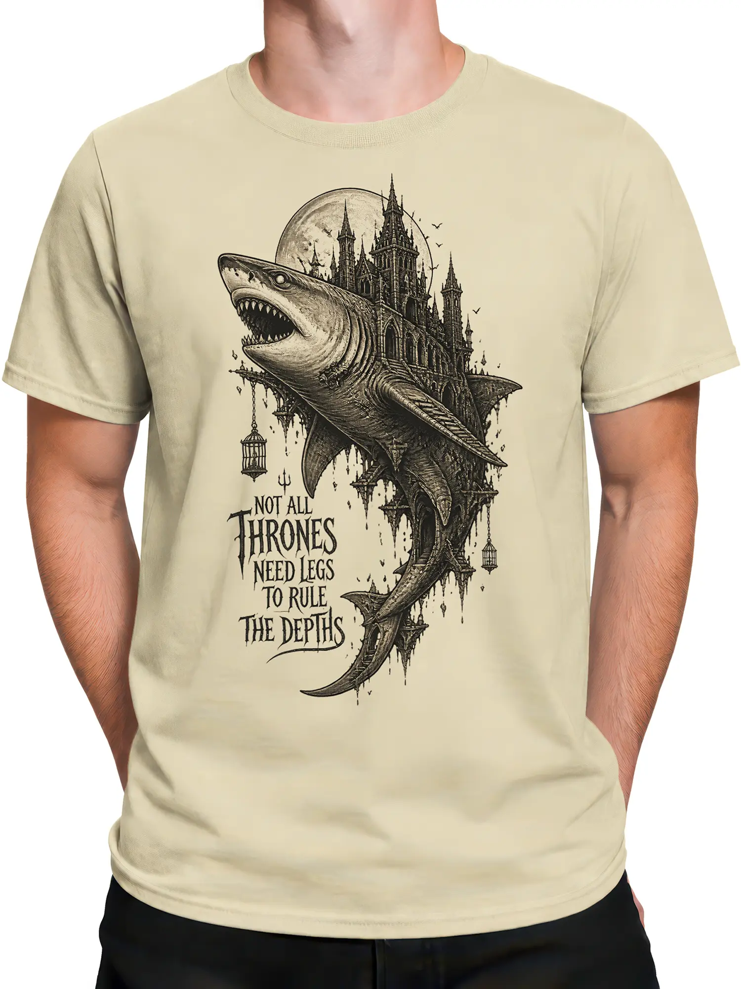 Male torso wearing a beige shark T-shirt with gothic castle artwork and a dark fantasy slogan
