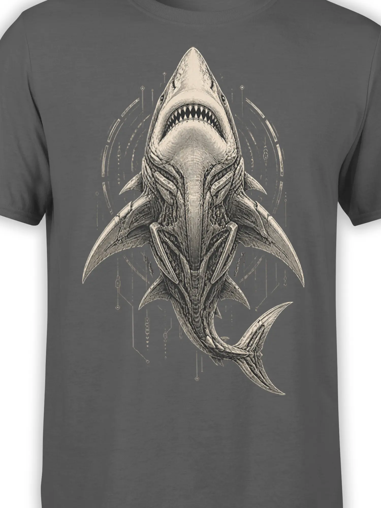 Close-up of the engraved-style shark artwork and circuit details printed on a dark gray T-shirt
