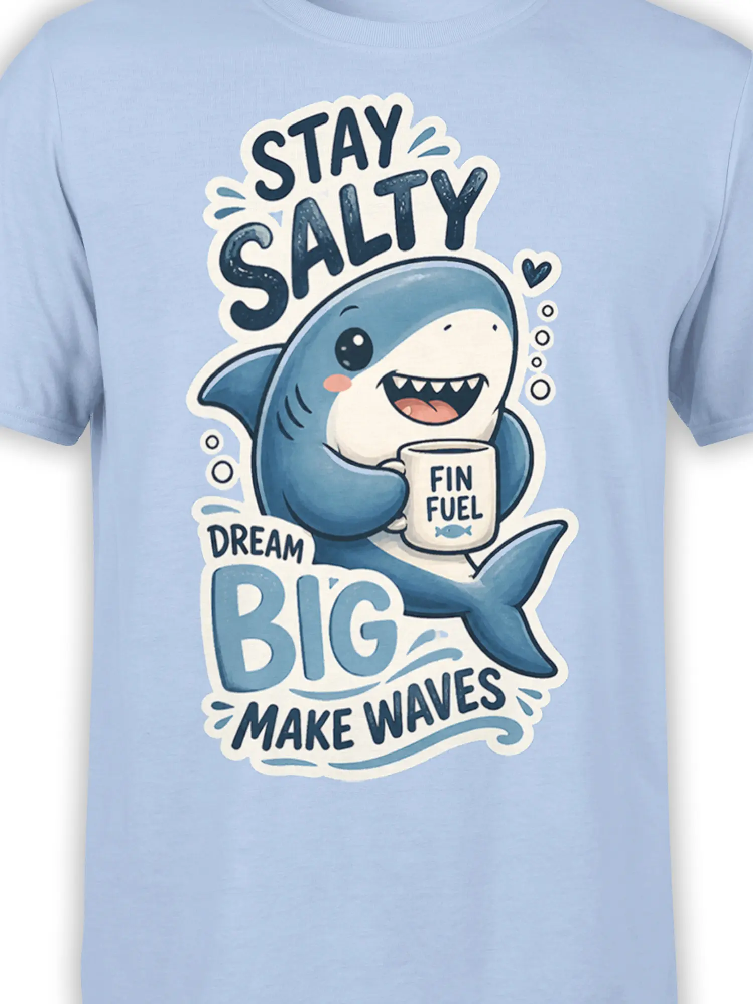 Close-up of smiling blue shark holding a FIN FUEL mug on a light blue graphic T-shirt