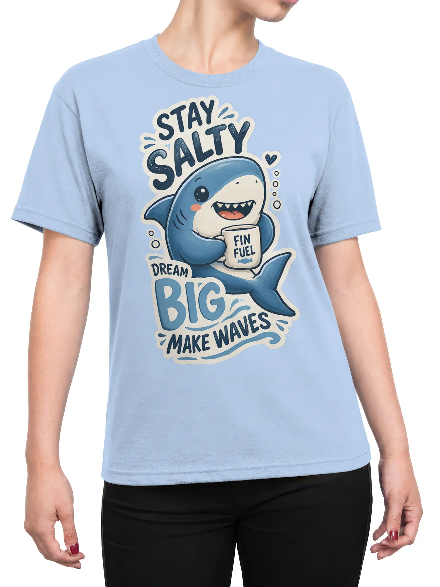 Female torso wearing a light blue shark T-shirt with Dream Big and Make Waves graphic