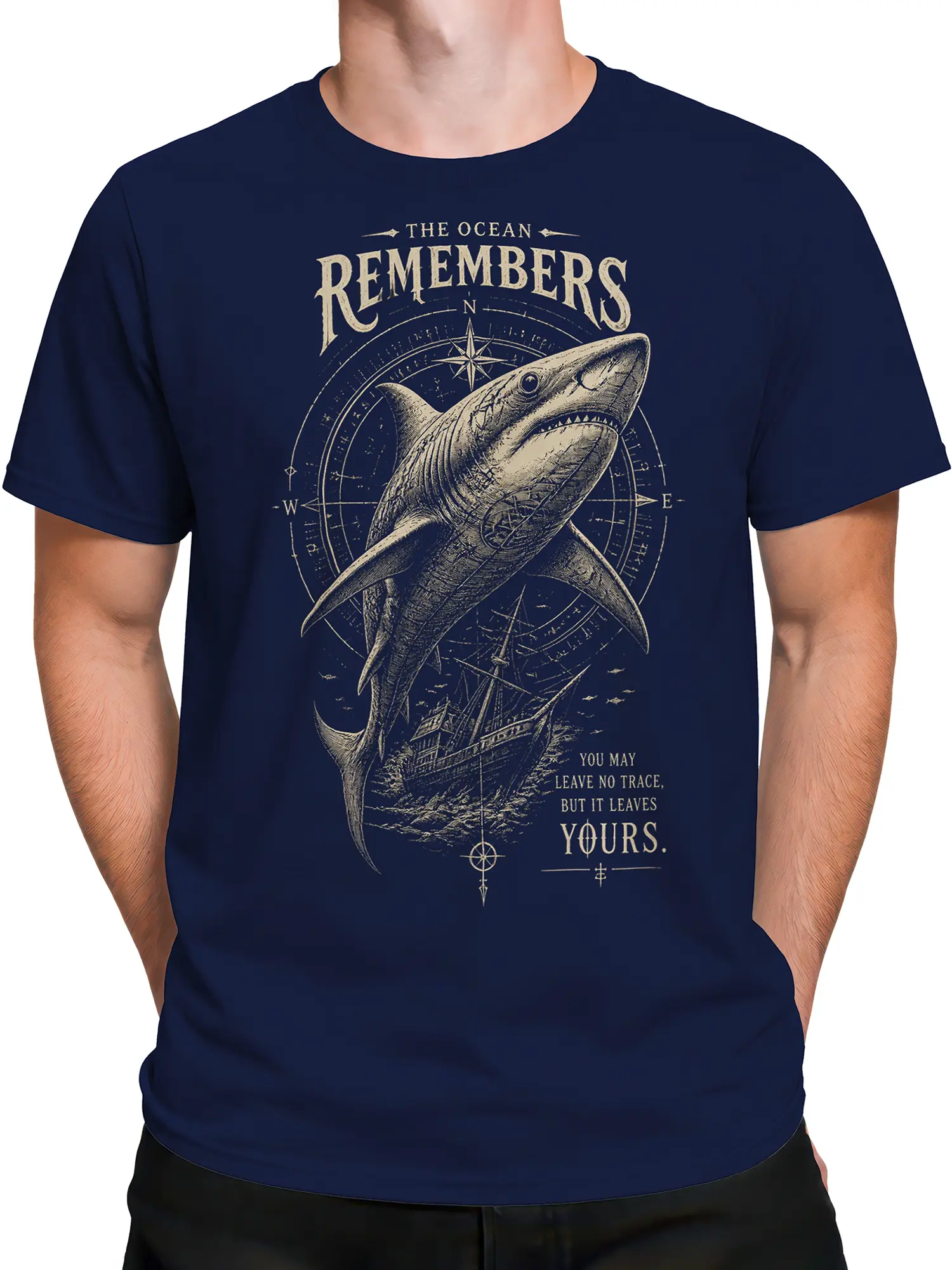 Male torso wearing navy Ocean Remembers shark T-shirt with nautical artwork