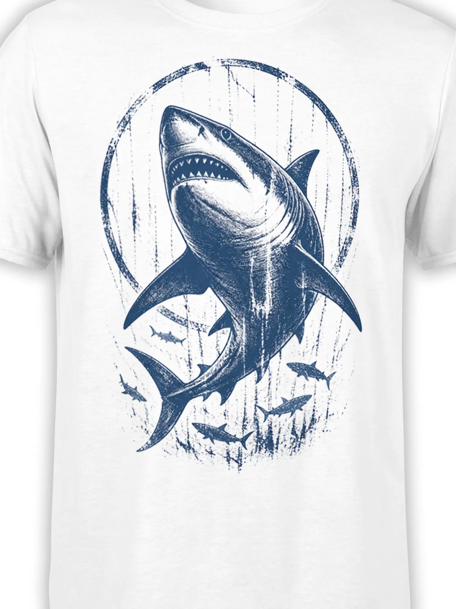 Close-up of distressed navy shark artwork with open jaws and smaller sharks on a white T-shirt