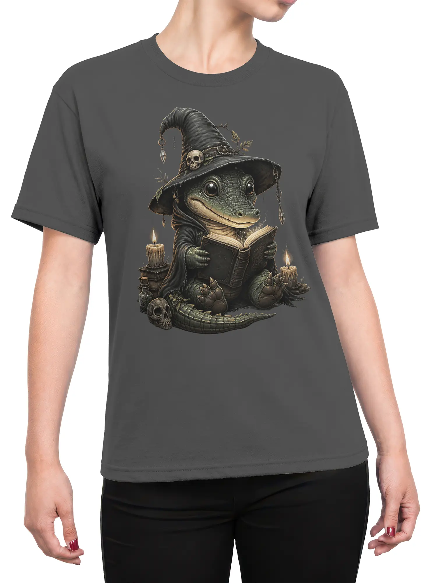 Female torso wearing a dark gray crocodile wizard T-shirt with a grimoire, candles, and skull artwork