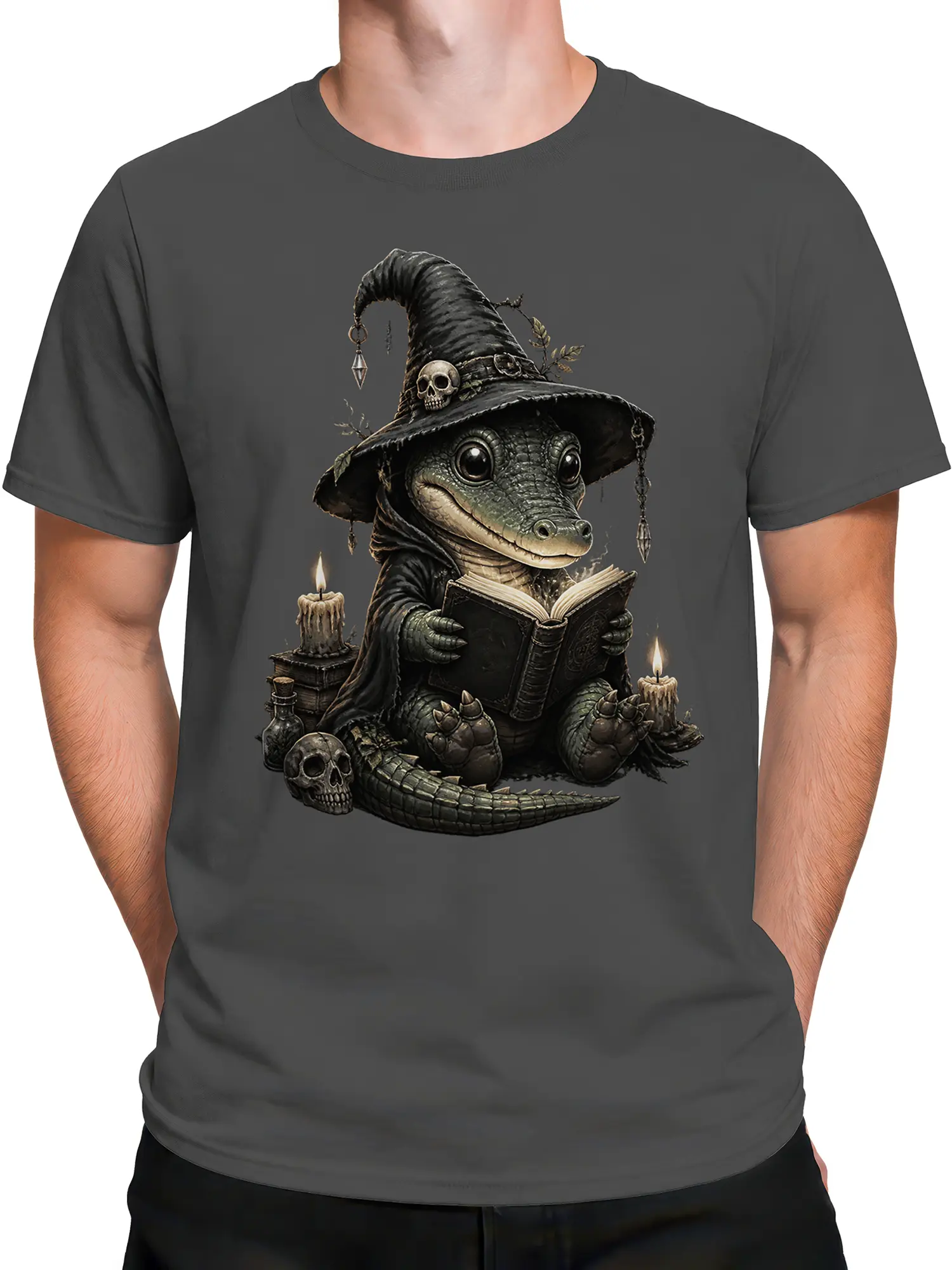 Male torso wearing a dark gray T-shirt with a crocodile wizard, grimoire, candles, and skulls