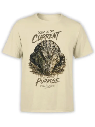 Detailed crocodile breaking through water on a beige T-shirt with silent current purpose lettering