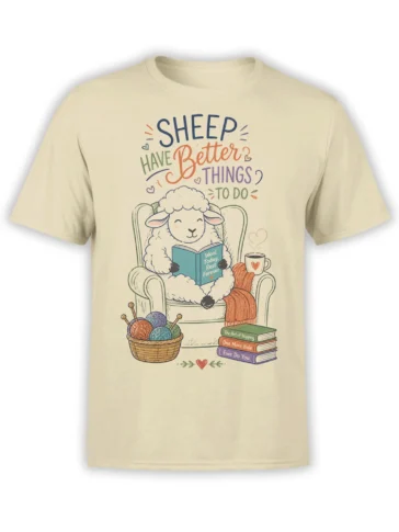Beige sheep T-shirt with a cozy illustrated sheep reading, knitting, and enjoying a warm cup under a playful message