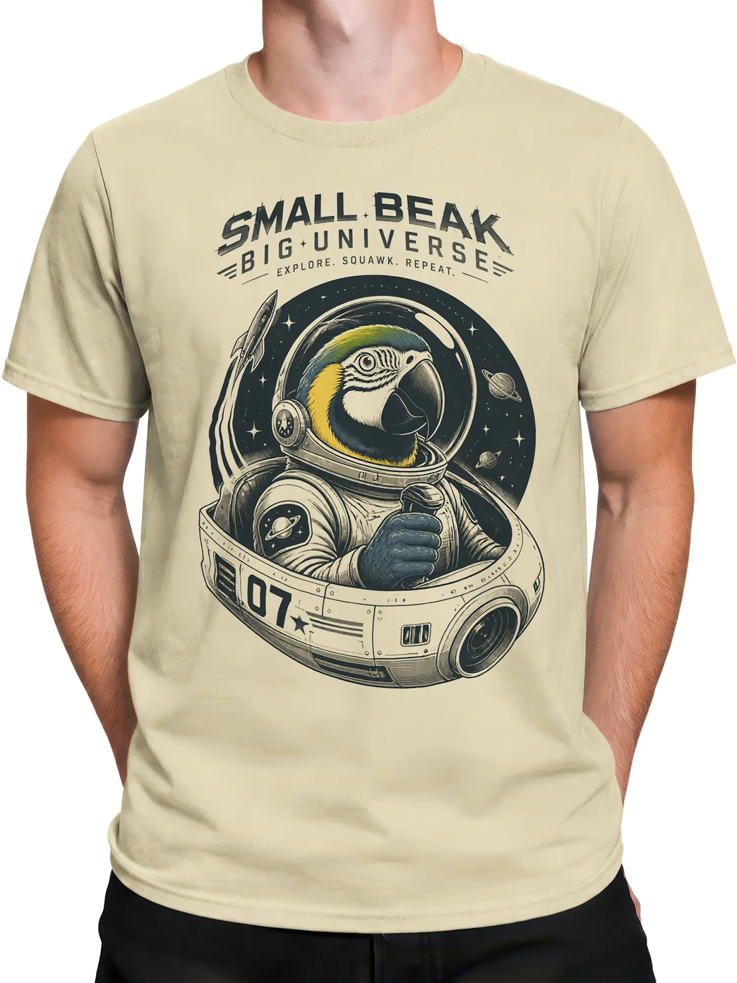 Male torso wearing a beige parrot astronaut T-shirt with vintage space artwork