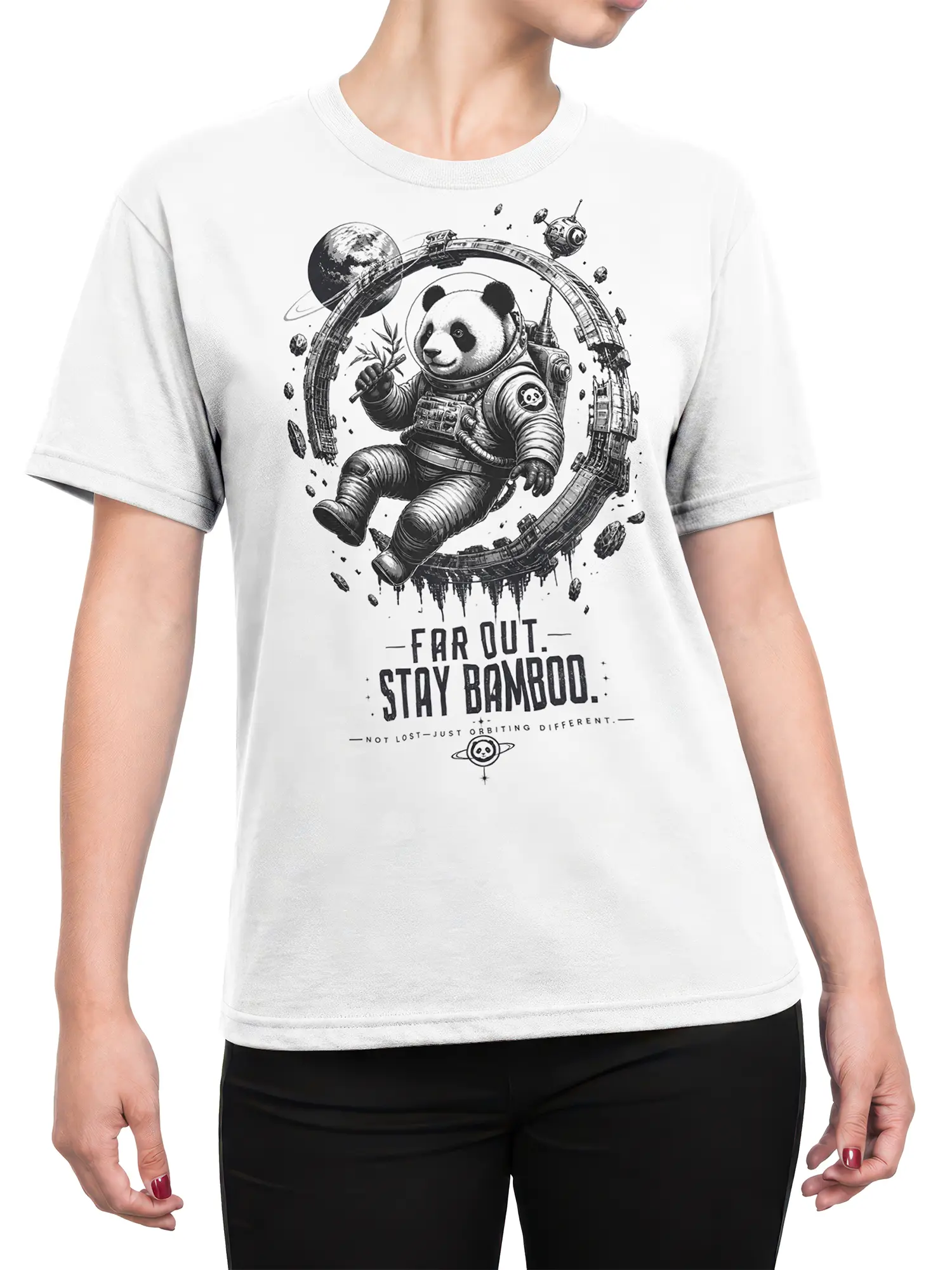 Female torso wearing a white T-shirt with a panda astronaut, bamboo branch, and retro space artwork