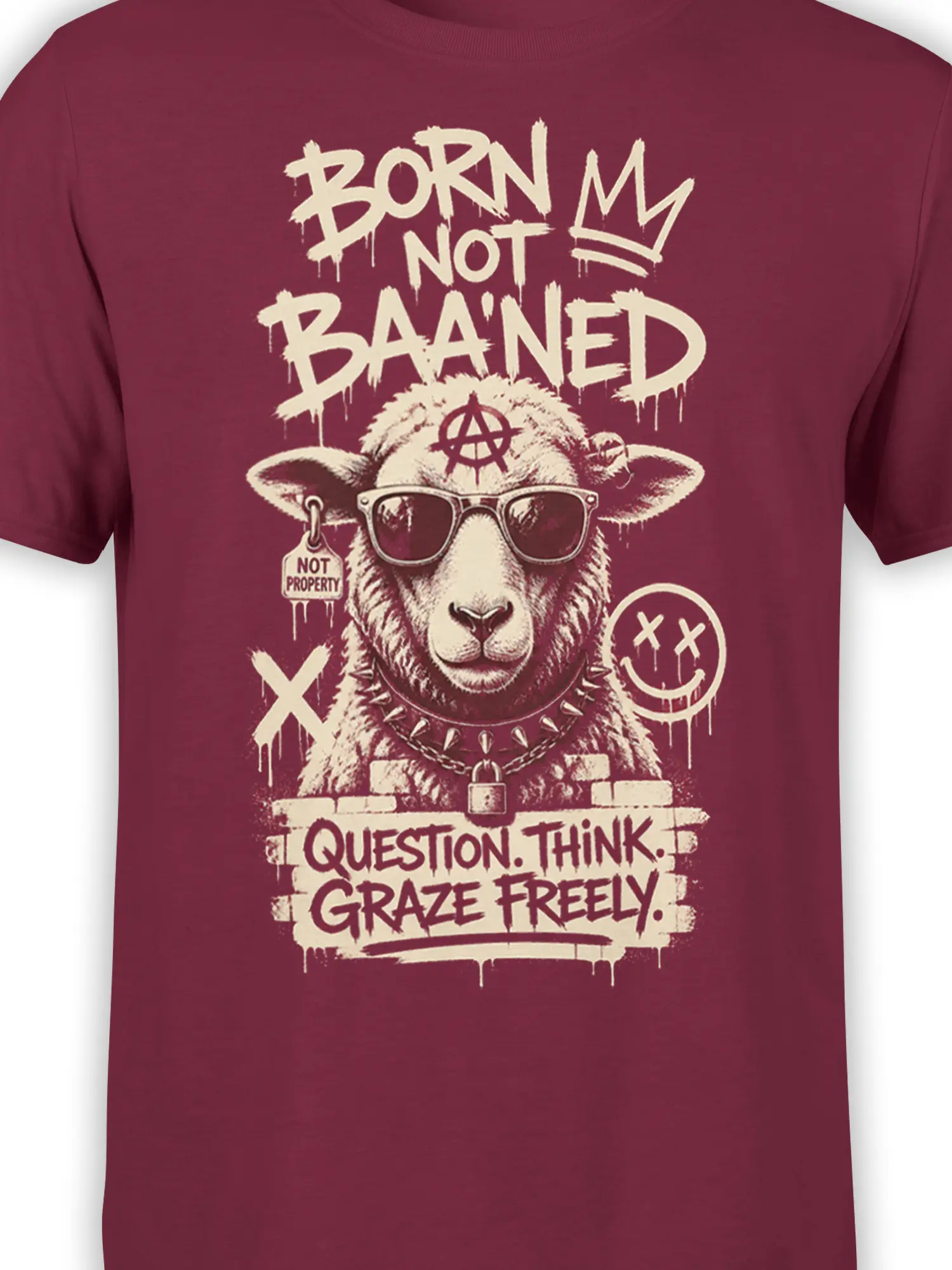 Close-up of the rebellious sheep graphic, sunglasses, spiked collar, and punk lettering on burgundy fabric