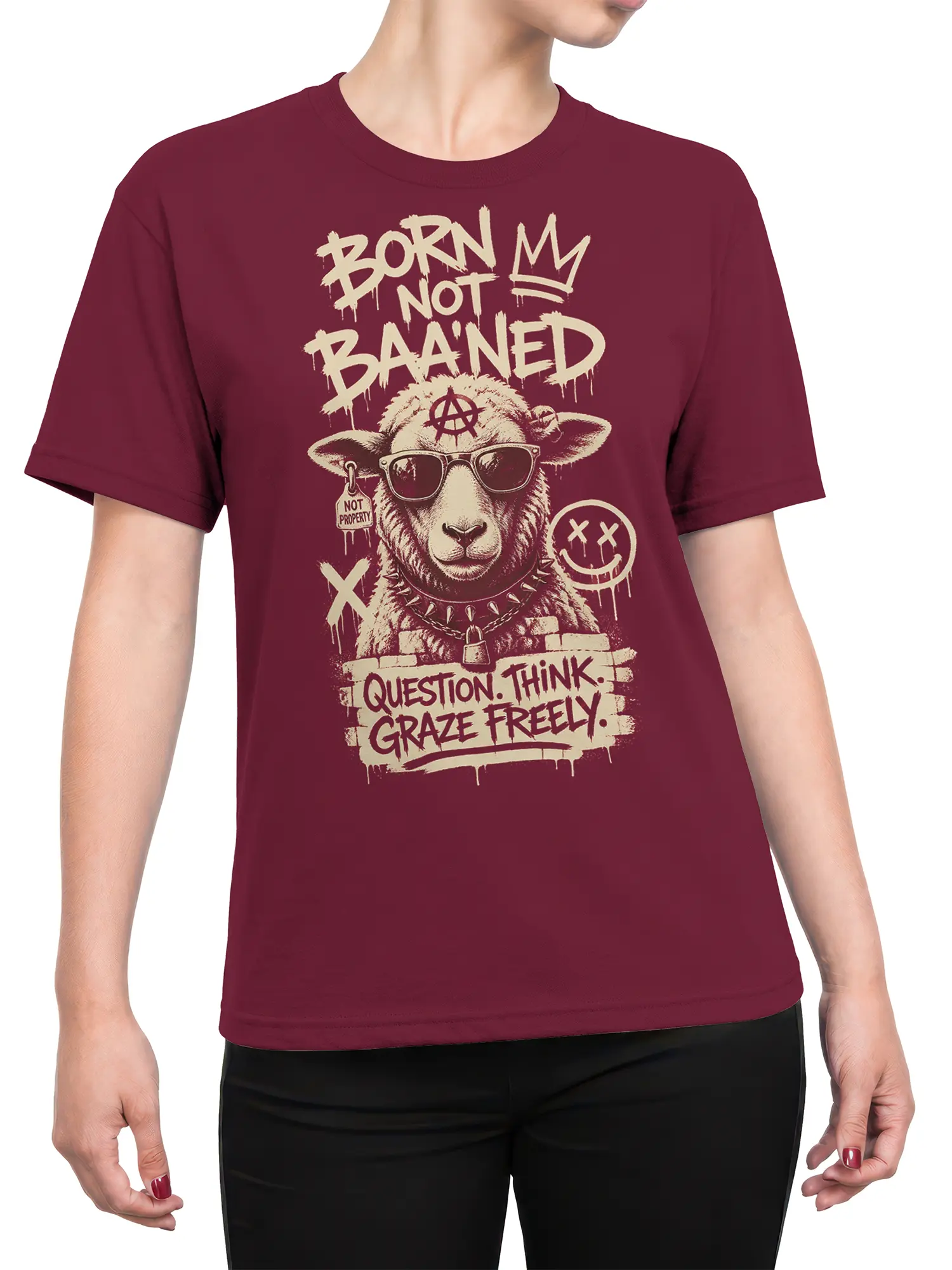Female torso wearing a burgundy sheep graphic tee with sunglasses, punk lettering, and a rebellious message