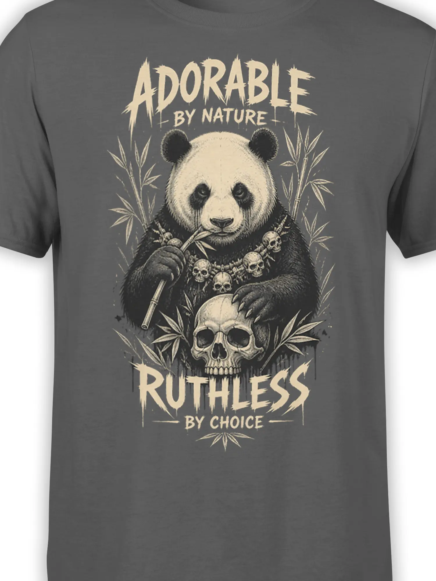 Close-up of ruthless panda artwork with bamboo, skulls, and cream lettering on a gray graphic tee