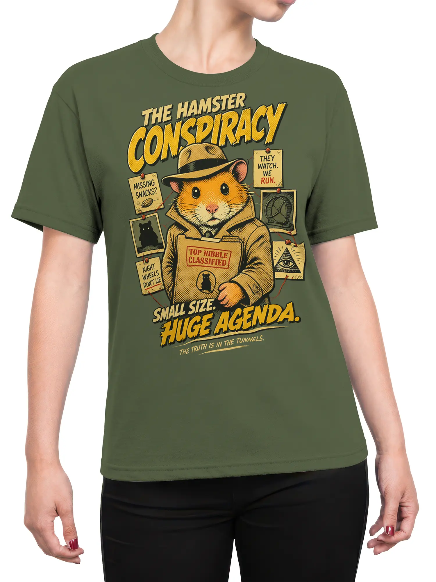 Female torso wearing a green hamster conspiracy T-shirt with a detective hamster and classified snack-themed artwork
