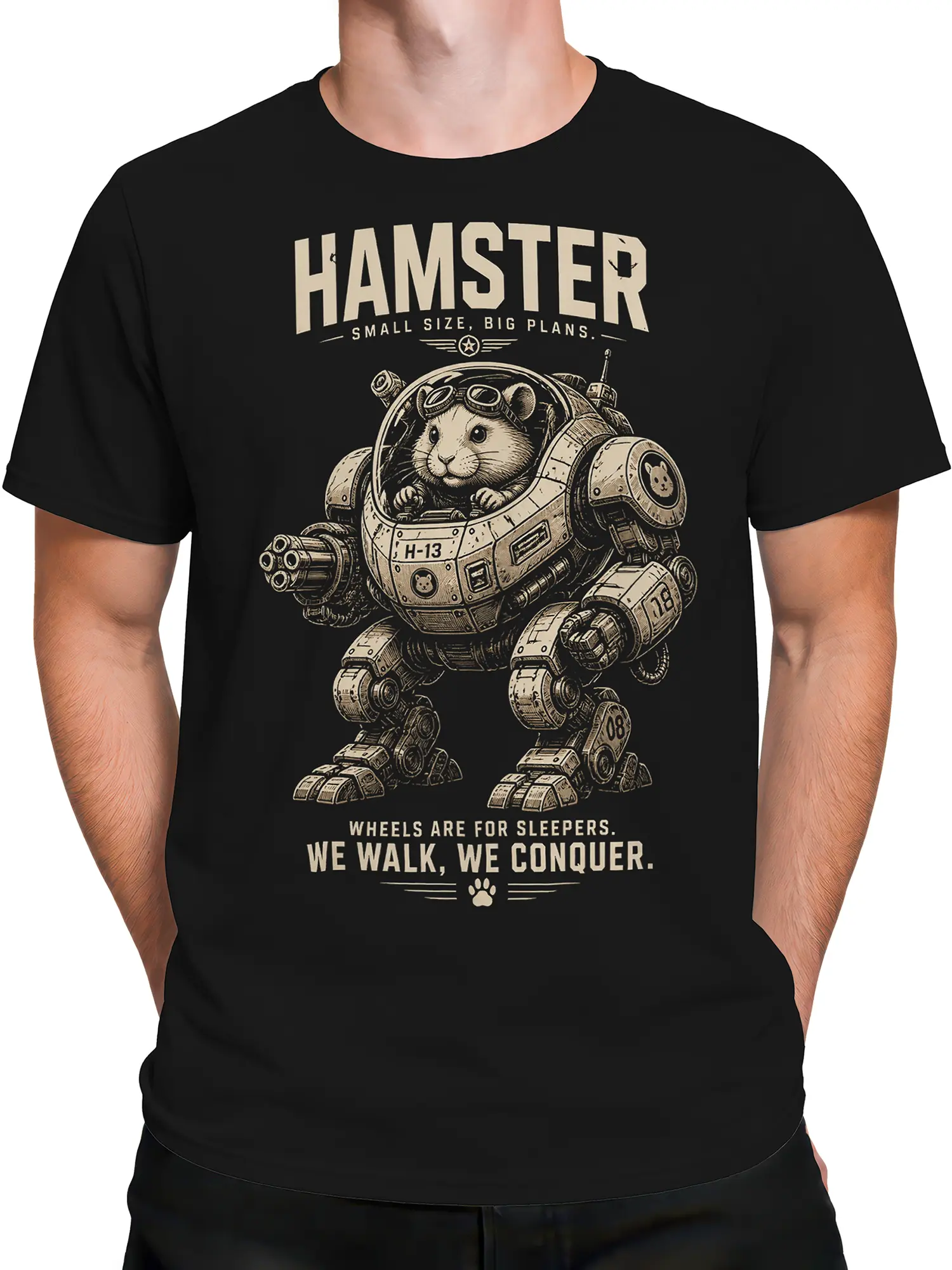 Male torso wearing a black hamster T-shirt with detailed retro mechanical artwork and conqueror text