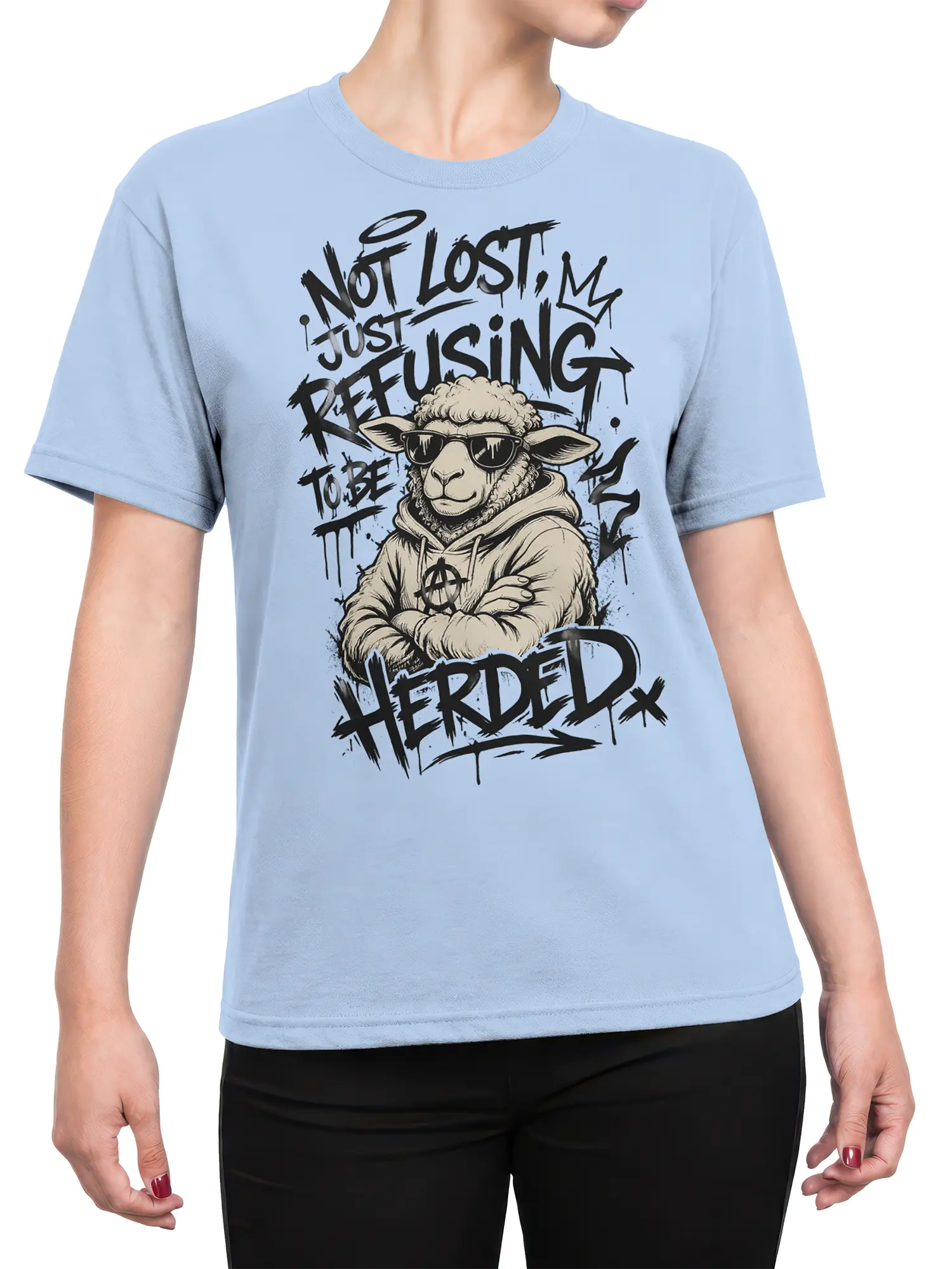 Female torso wearing a light blue sheep graphic tee with sunglasses and rebellious graffiti lettering