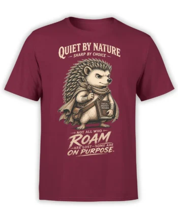 Storybook hedgehog adventurer graphic with a cape, satchel, and focus message on a burgundy T-shirt