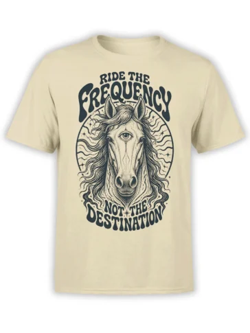 Mystical unicorn third-eye graphic with cosmic stars and Ride the Frequency text on a beige T-shirt