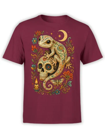 Ornate gecko curled around a floral skull with a crescent moon on a burgundy T-shirt