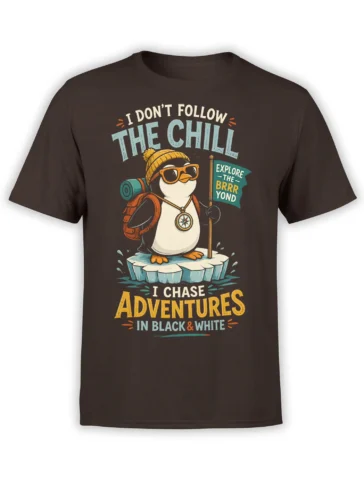 Vintage penguin explorer graphic on a brown shirt with backpack, compass, ice floe, and adventure lettering