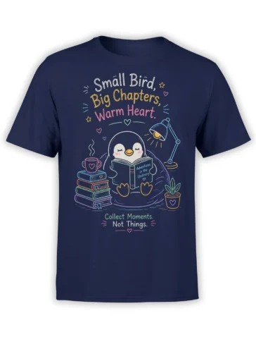 Cozy penguin reading book graphic with coffee, books, and warm lettering on a navy T-shirt