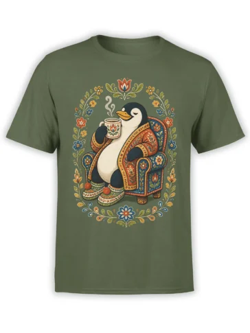 Green T-shirt with a penguin holding a steaming cup in an ornate floral armchair