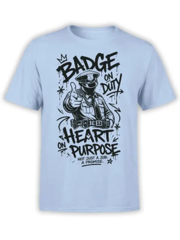 Light blue police officer T-shirt with badge artwork, thumbs-up pose, and “Not Just a Job. A Promise.” lettering