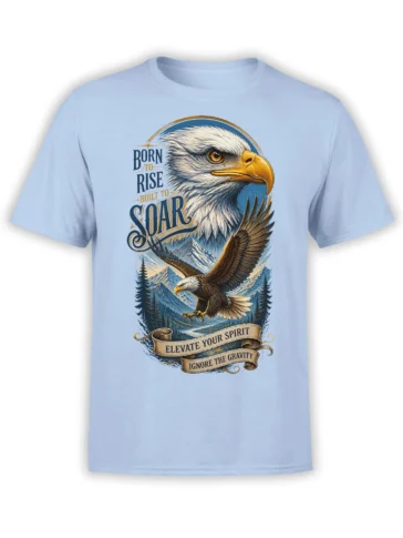 Light blue T-shirt with a bald eagle flying over snowy mountains and the words Born to Rise