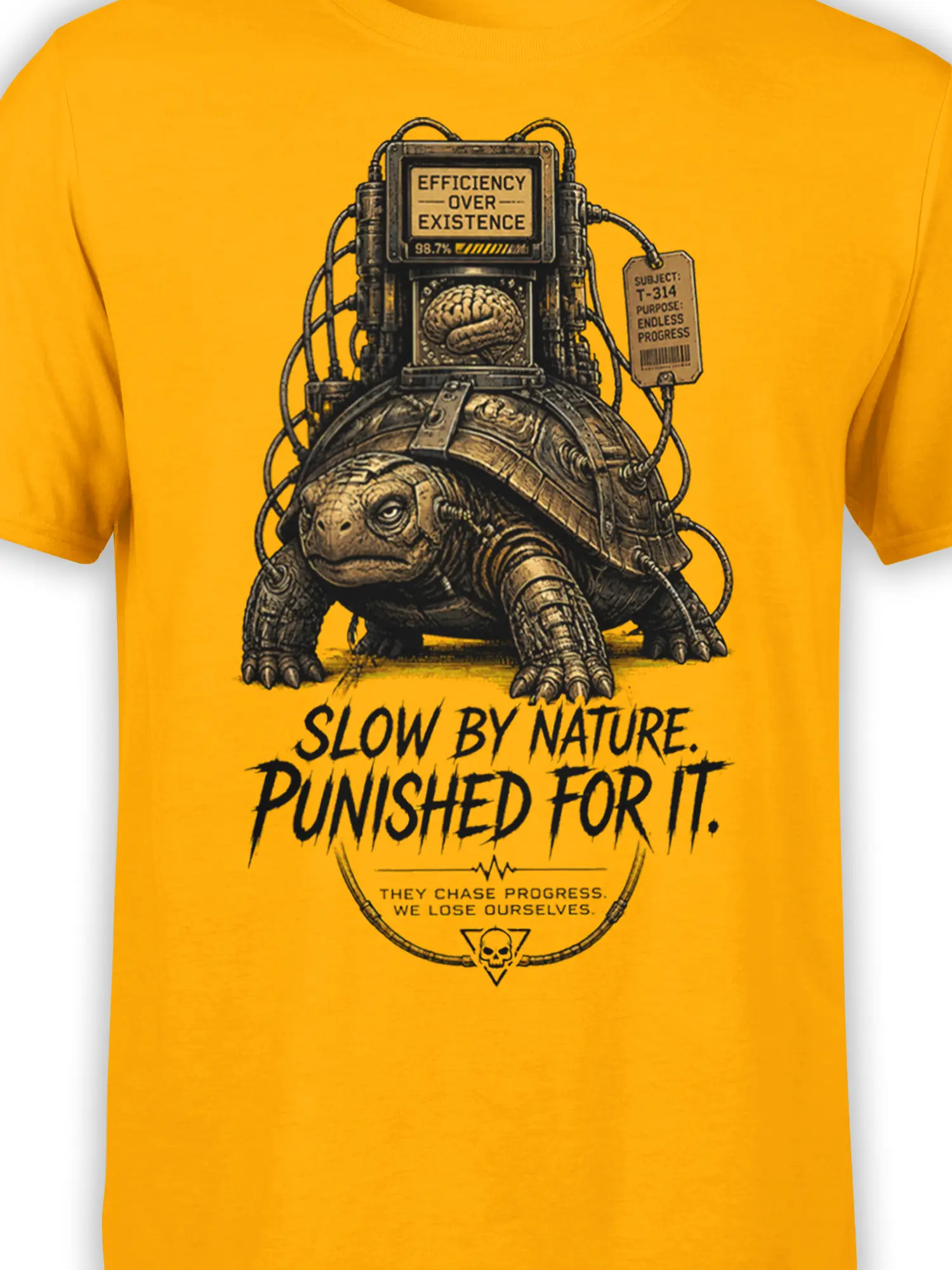 Close-up of mechanical turtle artwork, brain machine, cables, and distressed lettering on yellow fabric