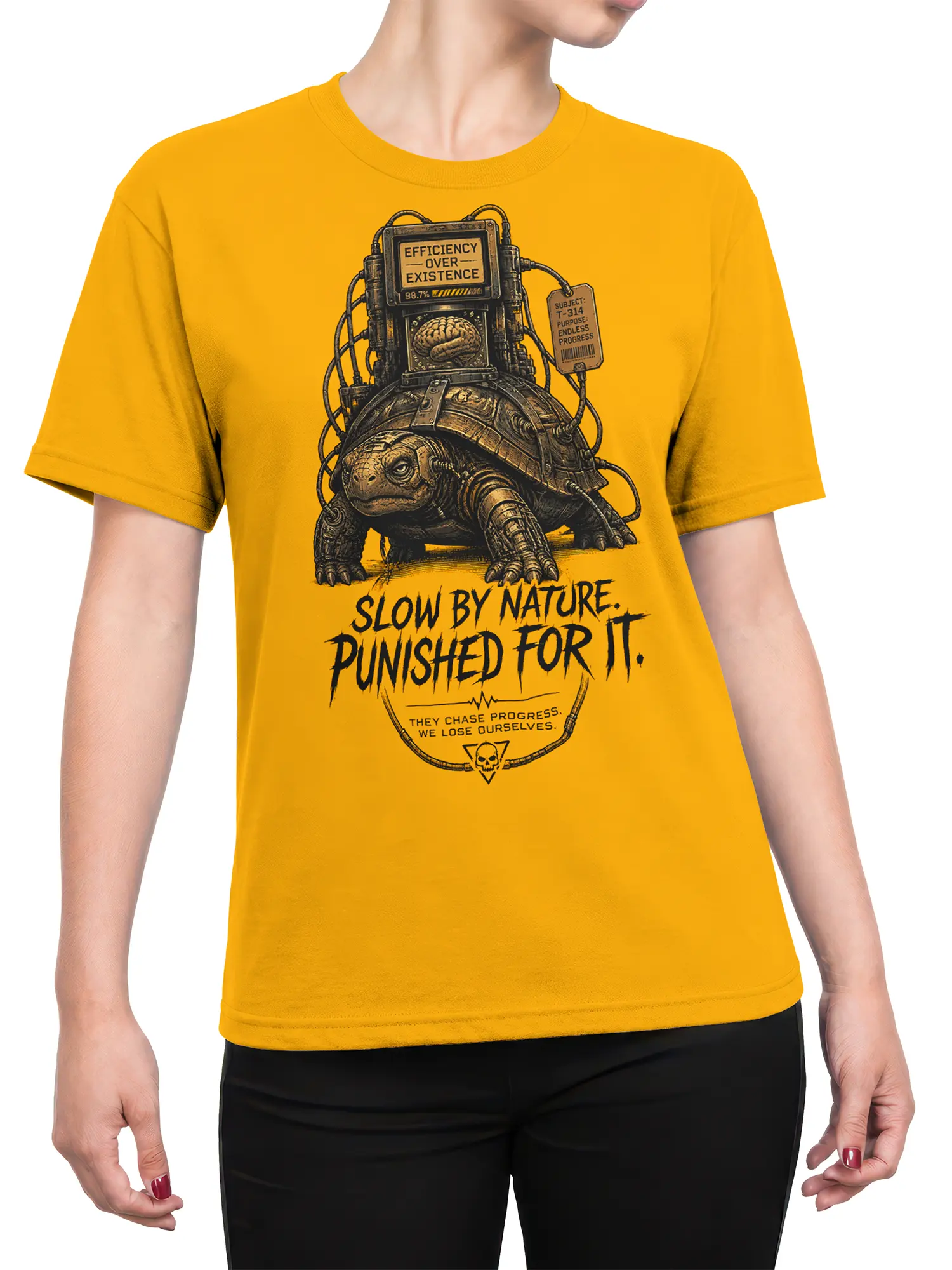 Female torso wearing a yellow T-shirt with a mechanical turtle and slow living message