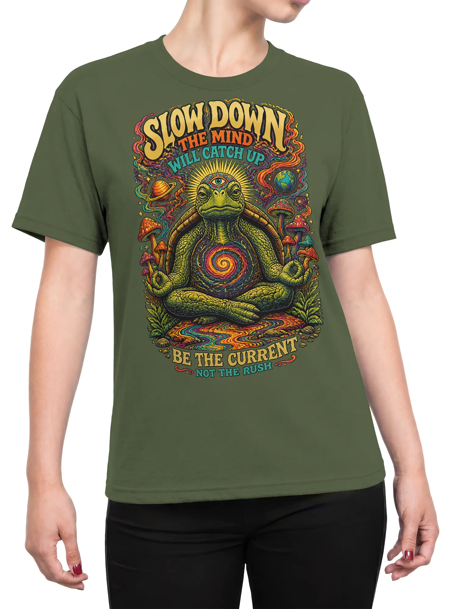Female torso wearing an olive green meditating turtle T-shirt with colorful cosmic artwork and mindful lettering