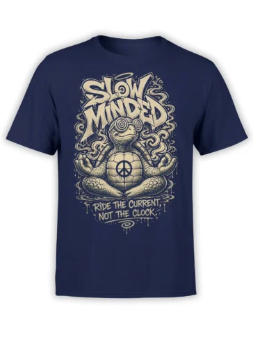 Slow Minded meditating turtle graphic with peace symbol and cream lettering on a navy T-shirt