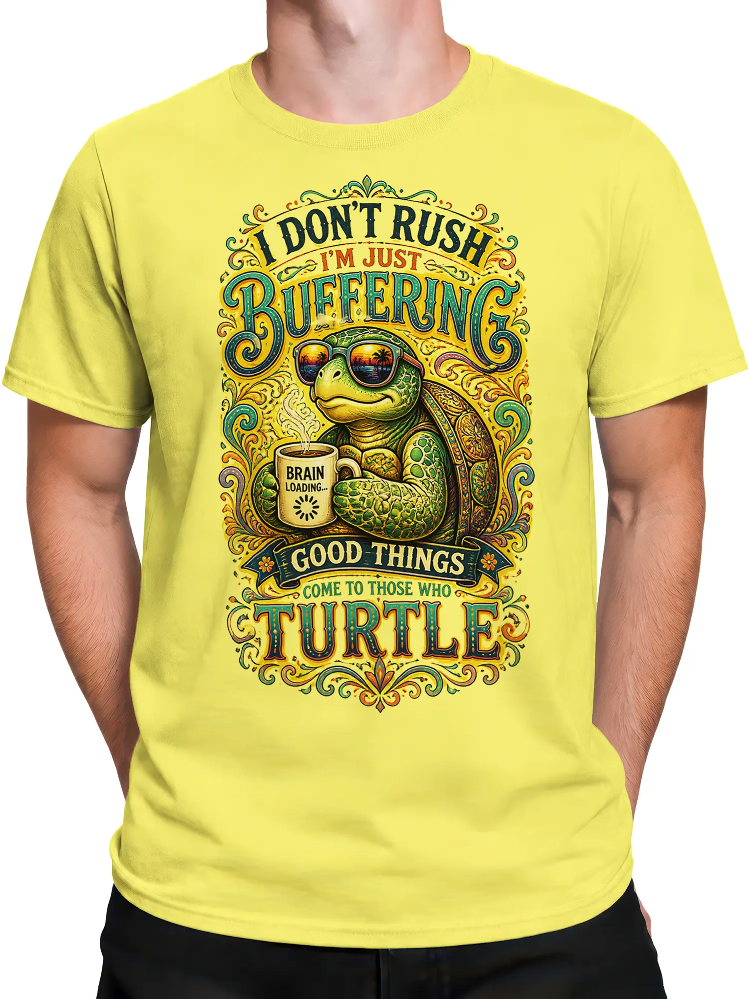 Male torso wearing a yellow turtle T-shirt with vintage lettering and a brain loading coffee graphic