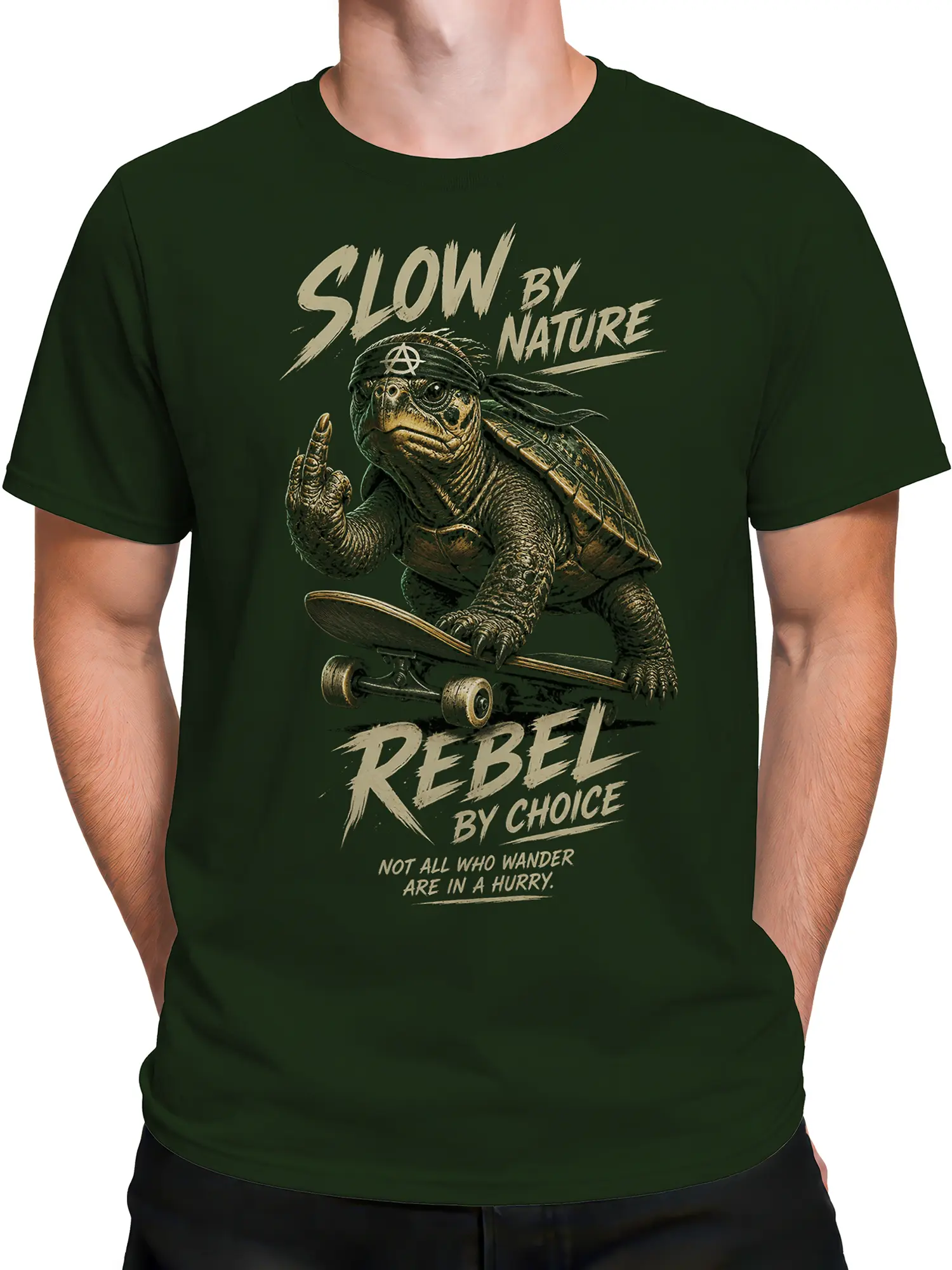 Male torso wearing a green skateboarding turtle T-shirt with vintage cream lettering and rebel attitude