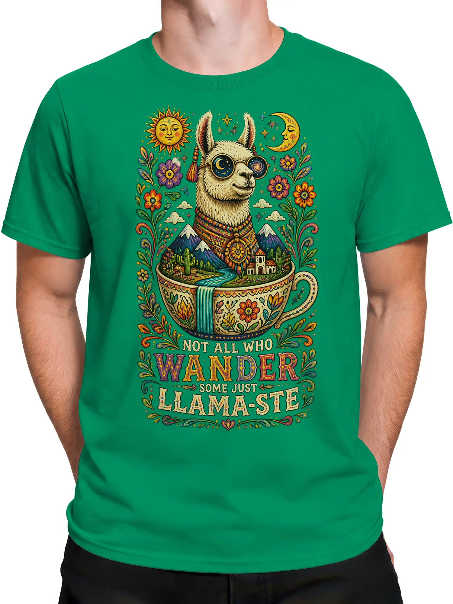 Male torso wearing a green graphic T-shirt with a celestial-glasses llama, flowers, mountains, and wanderer slogan