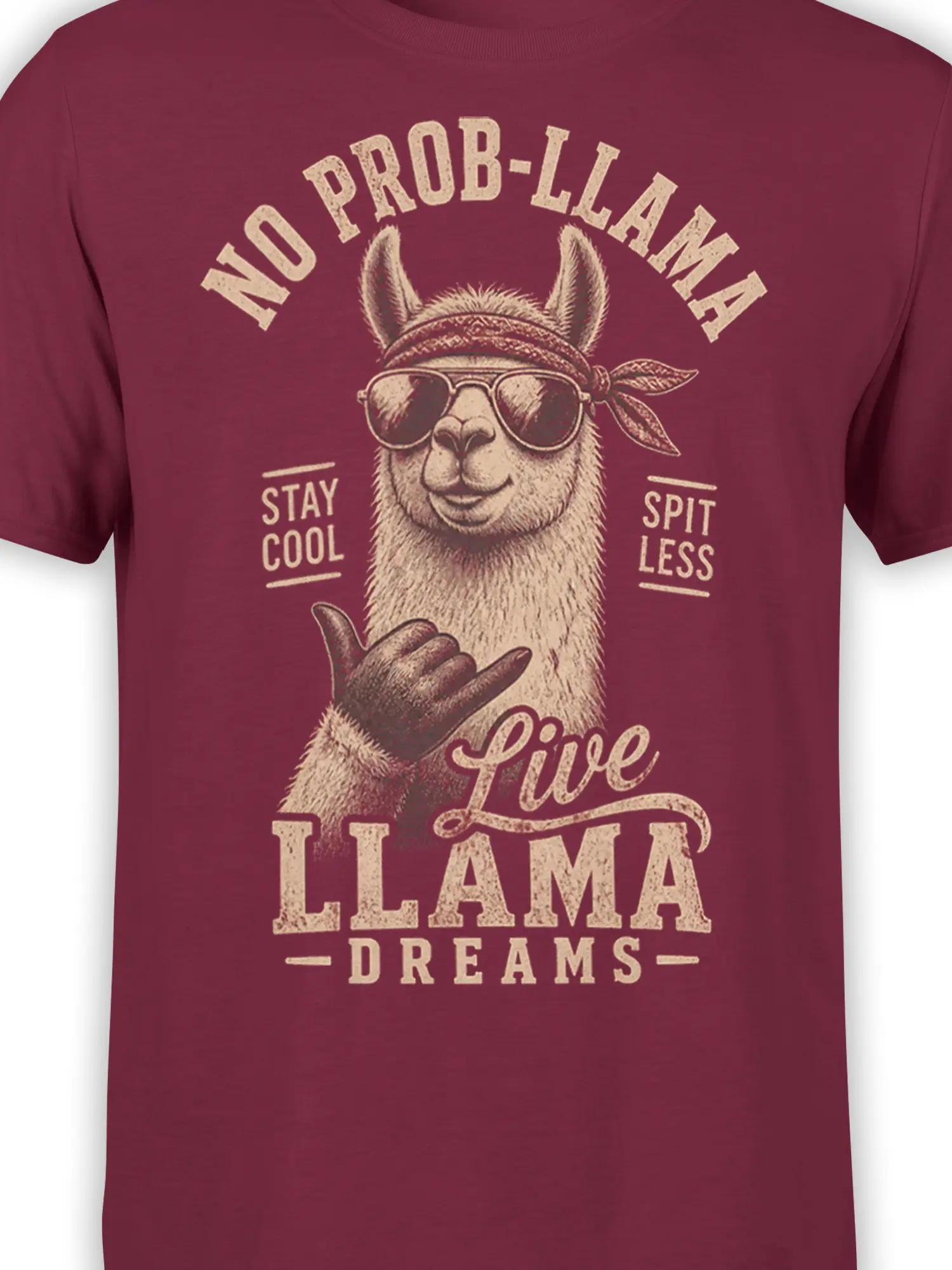 Close-up of the maroon llama T-shirt design with sunglasses, bandana, shaka hand, and distressed cream text