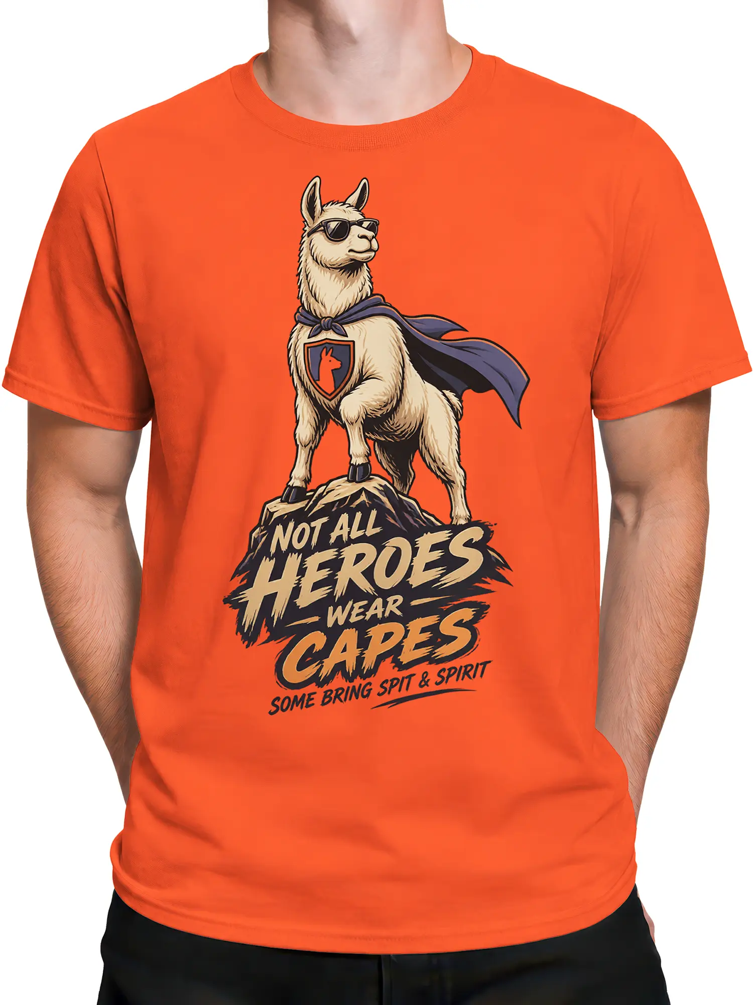 Male torso wearing an orange superhero llama T-shirt with cape and mountain artwork