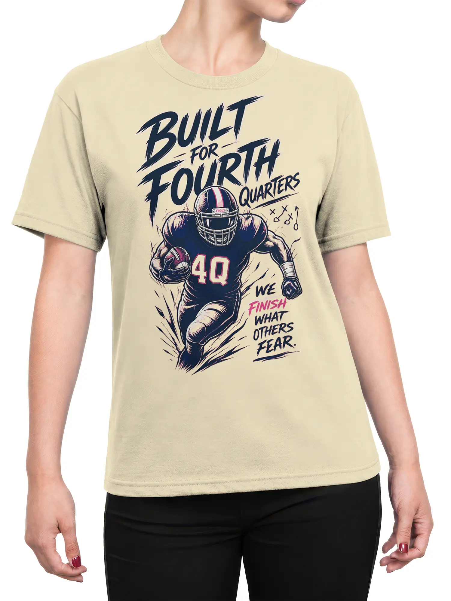 Female torso wearing a beige football T-shirt with a charging player graphic and fourth-quarter sports lettering