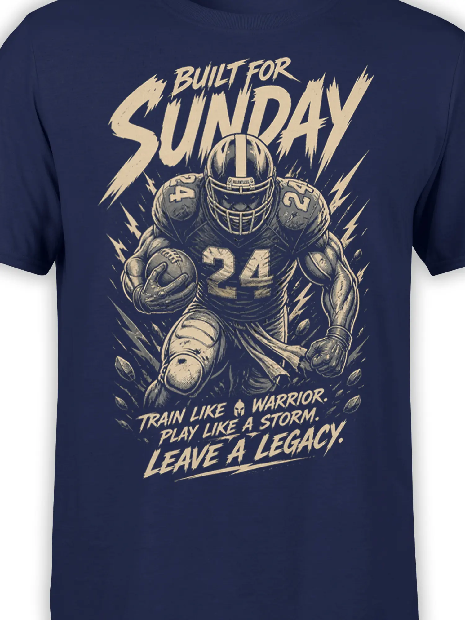 Close-up of navy football graphic tee showing player number 24, football helmet, ball, lightning, and cream text
