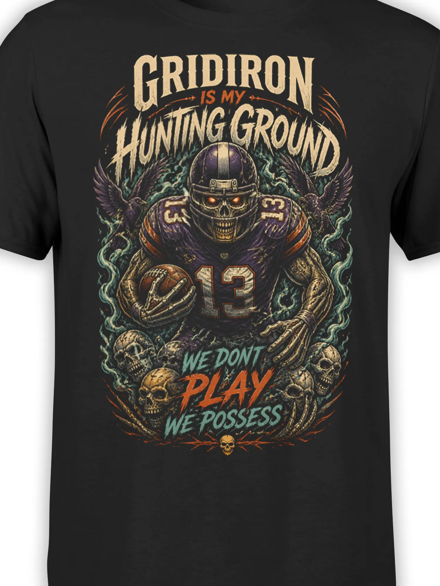 Close-up of skeleton football player artwork with skulls and distressed gridiron lettering on black fabric