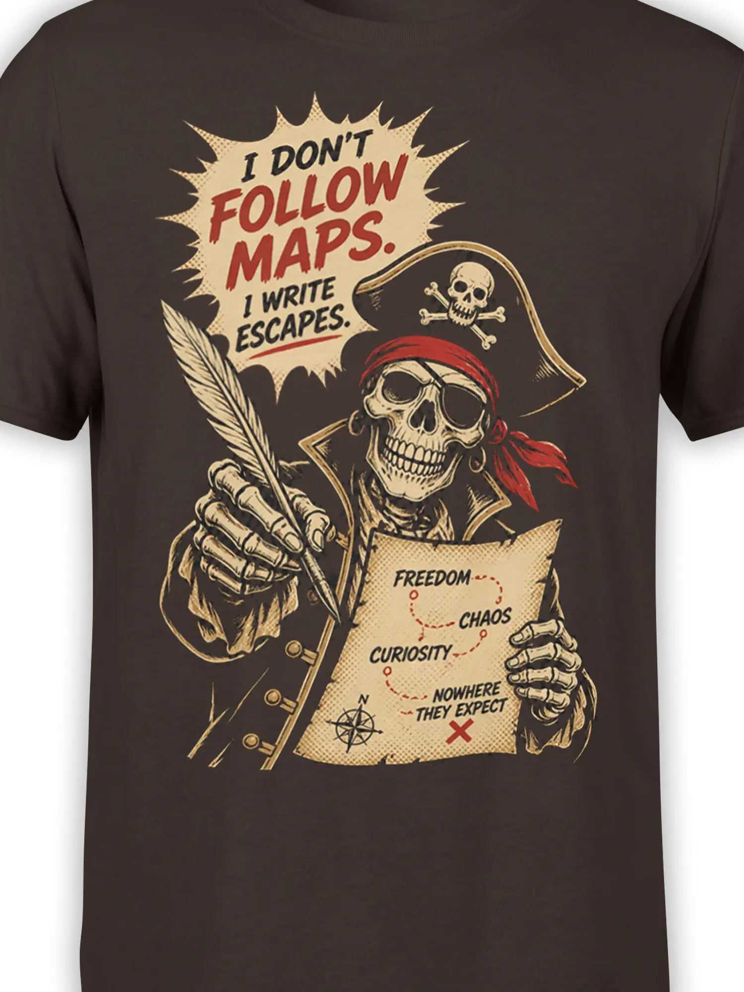 Close-up of brown pirate graphic tee showing the skeleton, red headscarf, quill, compass, and map details