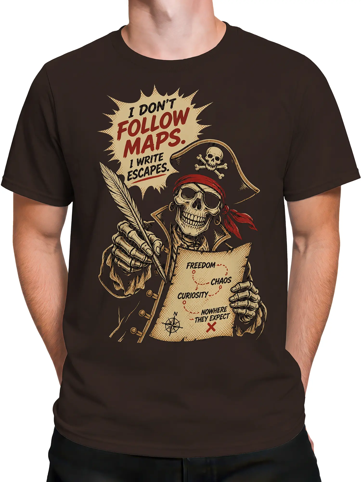 Male torso wearing a brown pirate T-shirt with a skeleton, illustrated map, quill, compass, and bold vintage lettering